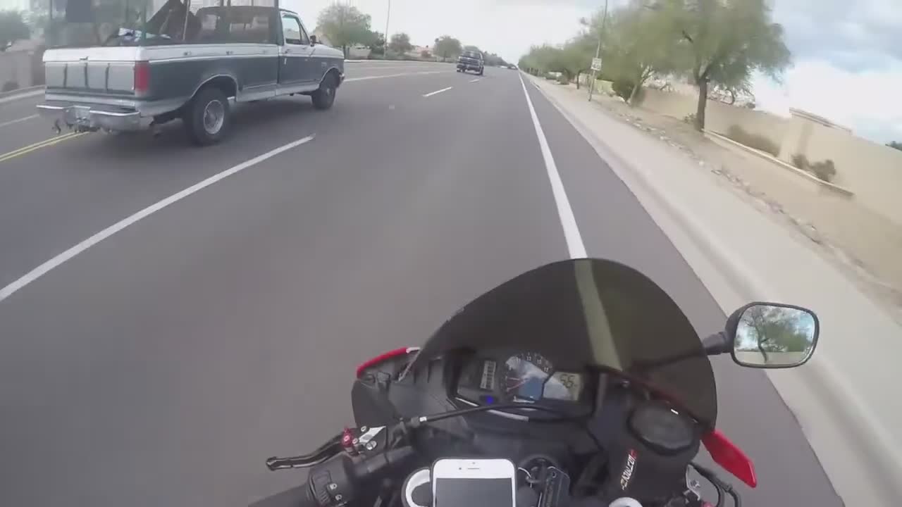 Passing out business cards from my motorcycle
