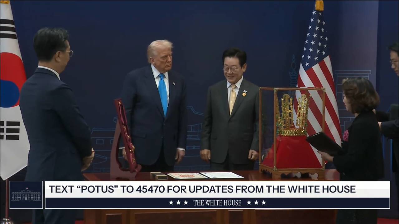 South Korea - Pres. Myung of South Korea presents Pres. Trump with a medal