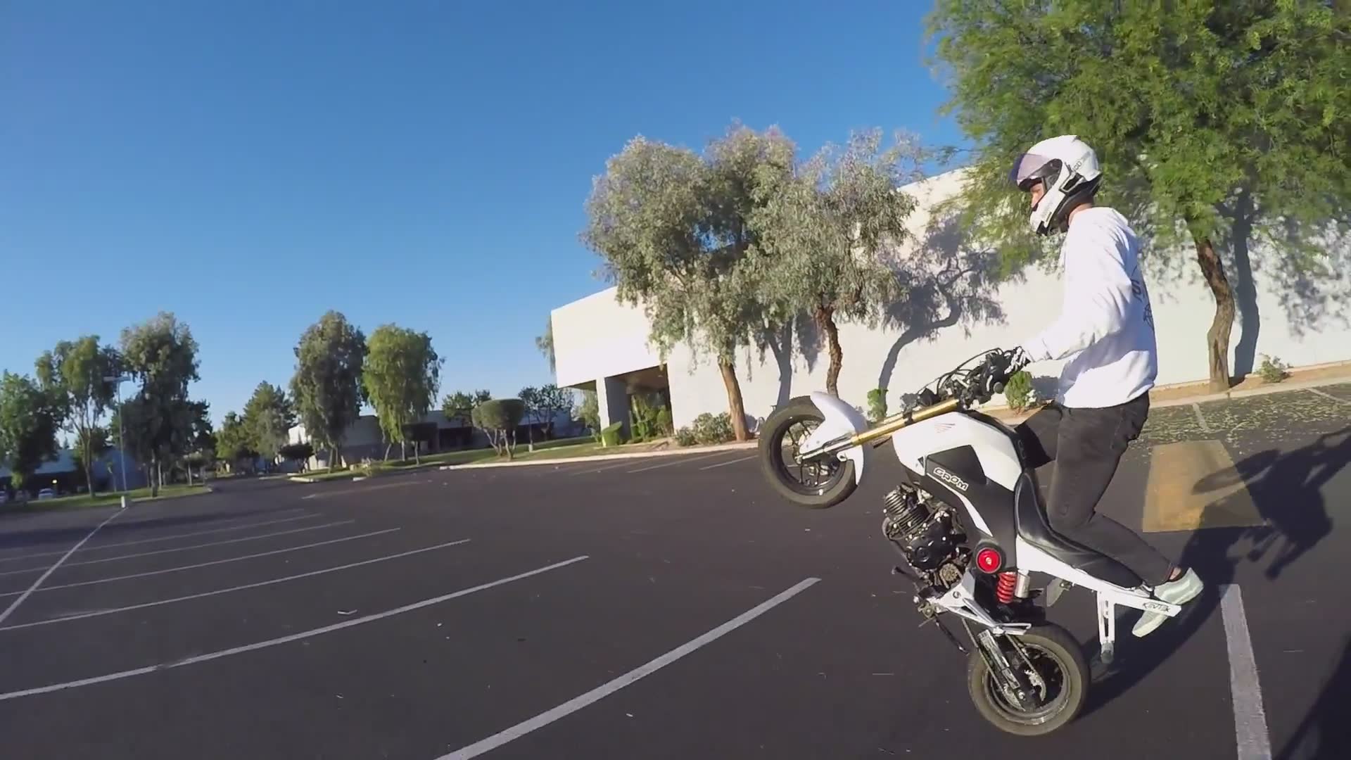 Standing wheelie technique explained with safety considerations and balance tips