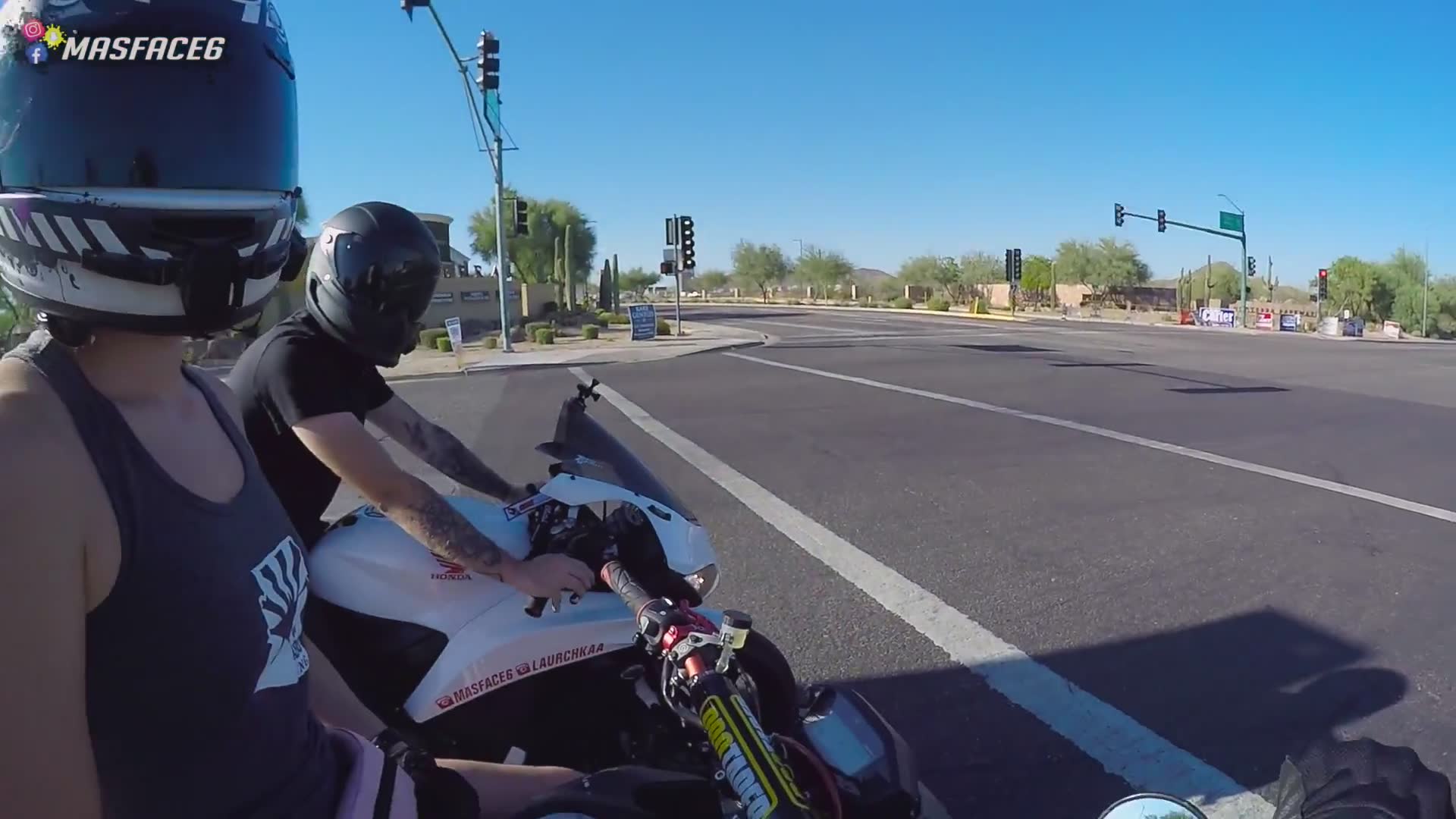 Riders visit electronics retailer parking lot creating spectacle on sport bikes