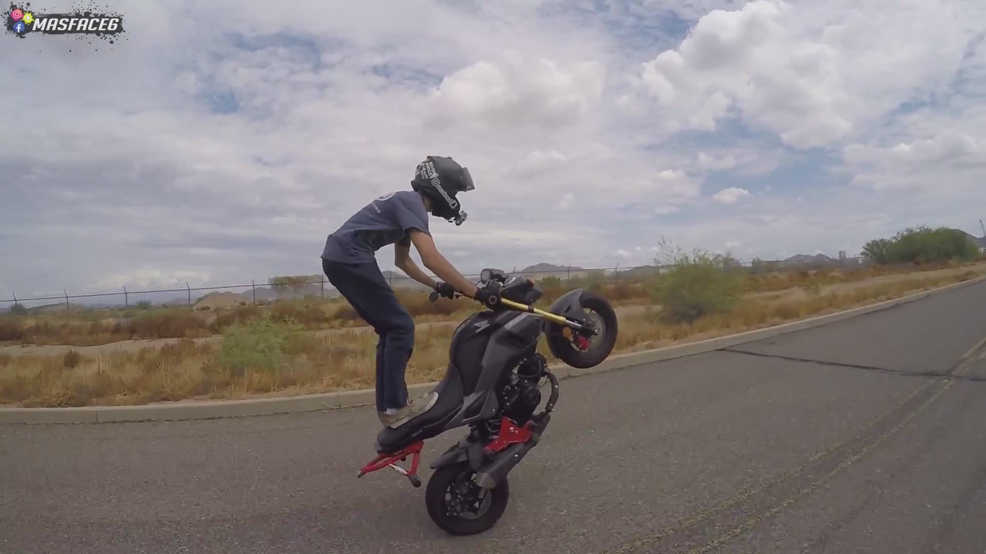 Stunt technique tutorial shows how to drag boot during wheelie for style points