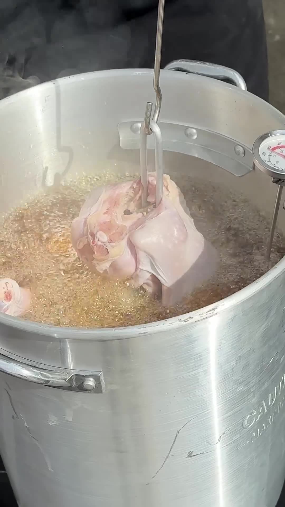 Frying a whole turkey in bacon grease for incredible flavor