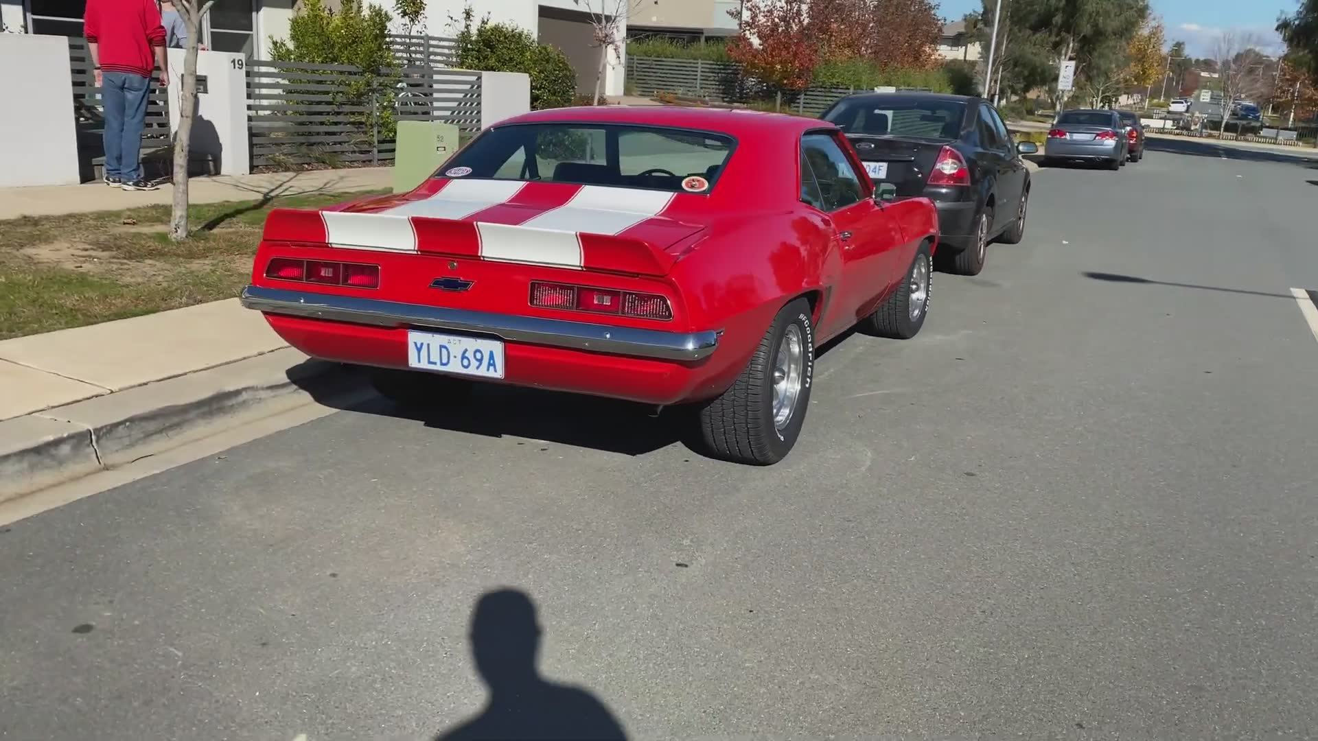 Classic American muscle car doing burnouts down under
