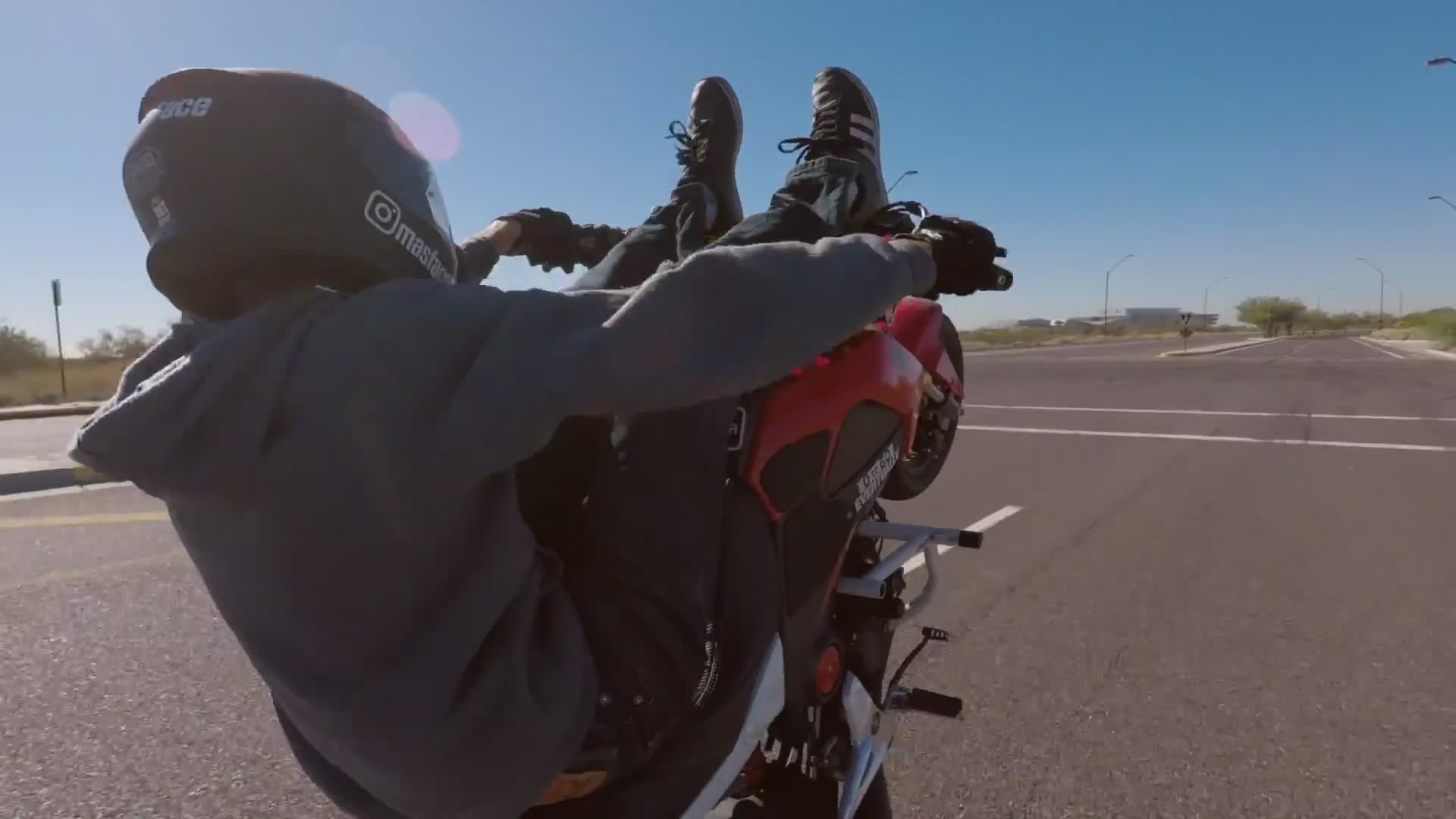 Impromptu gathering brings together local riders for parking lot hangout