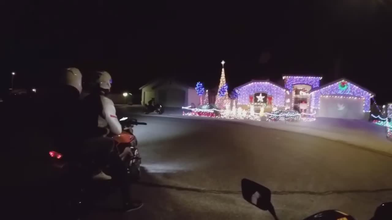 Holiday light display tour on motorcycles