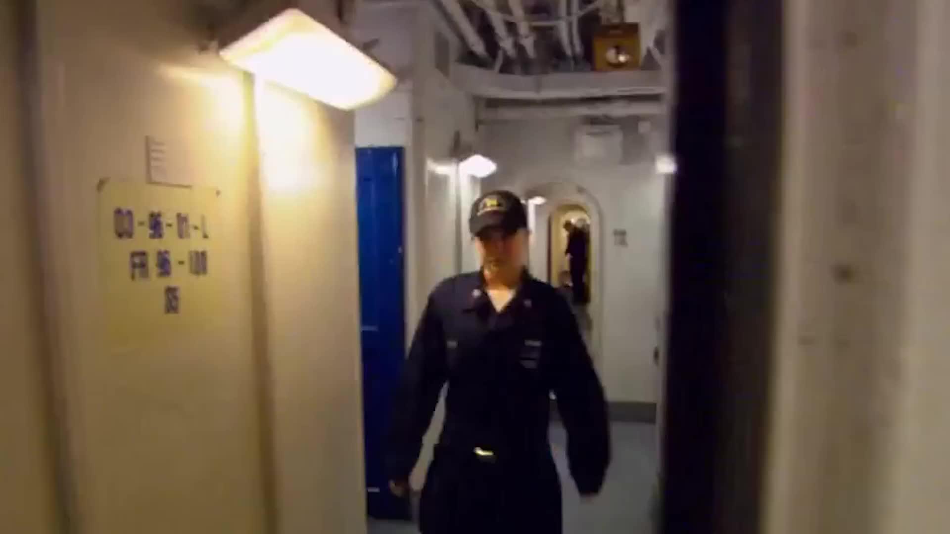 Hidden passageways beneath flight deck enable operations