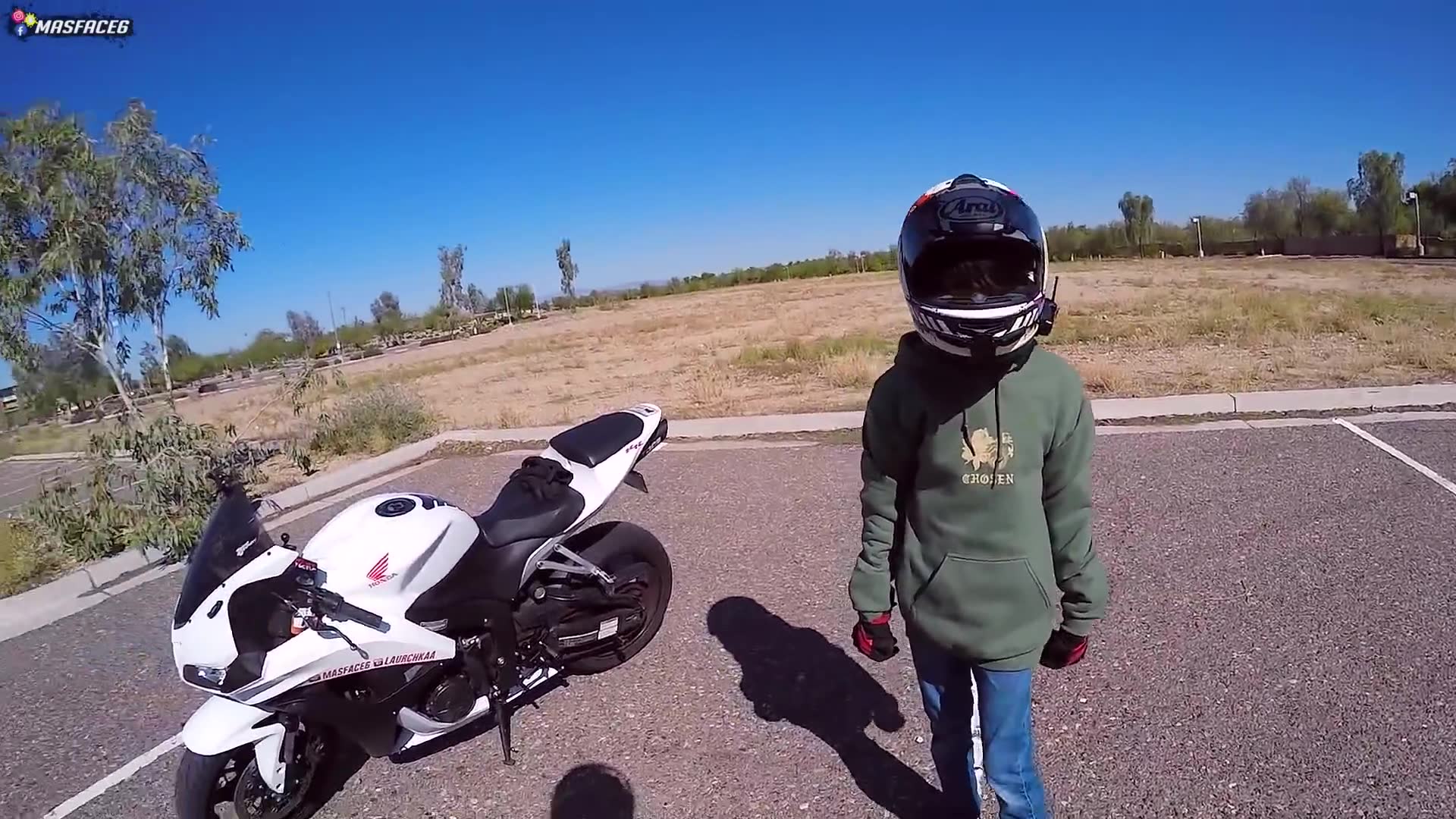 Young rider wired with microphone shares thoughts during first sportbike experience