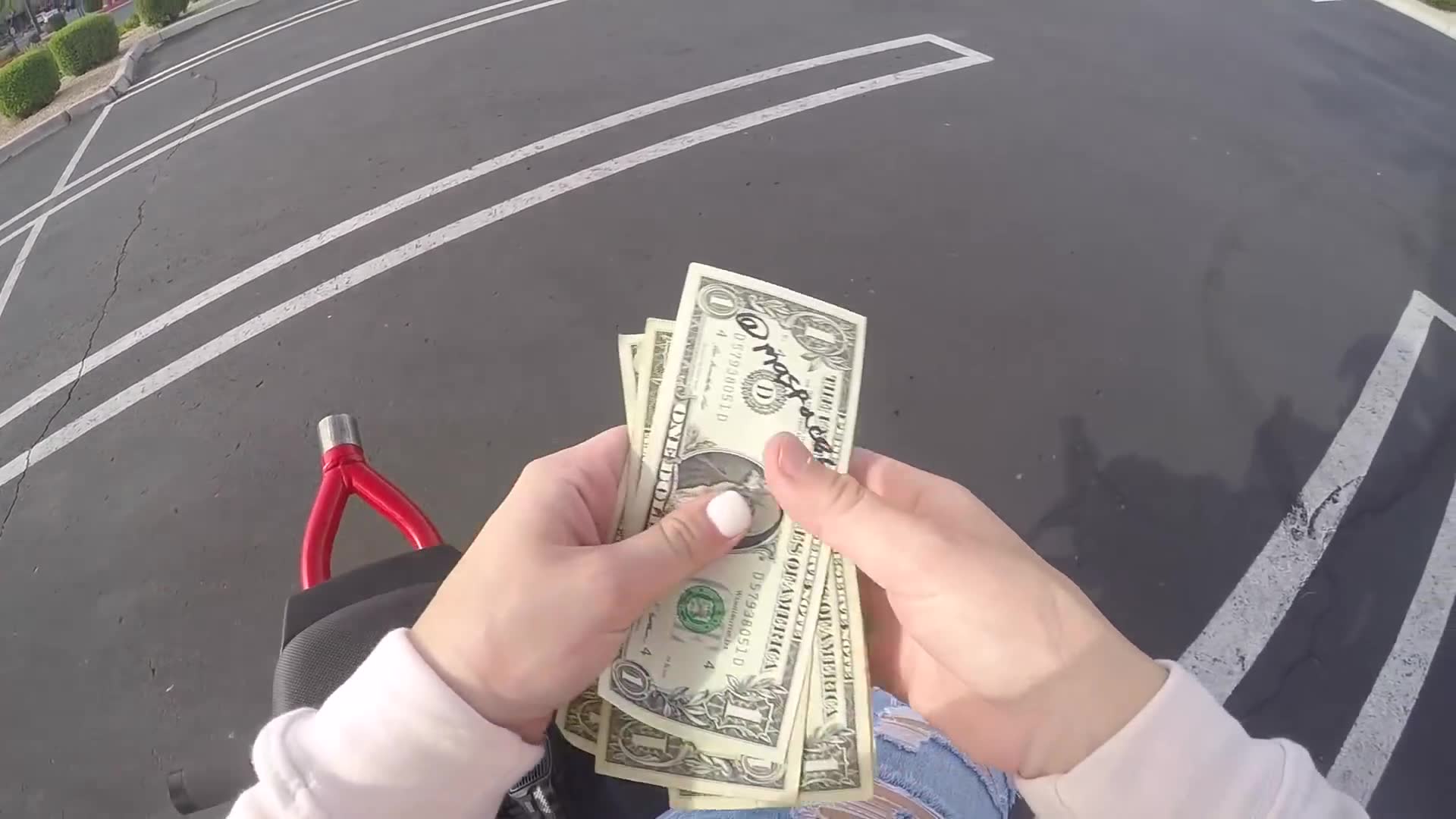 Trading one dollar for random items from strangers on the street