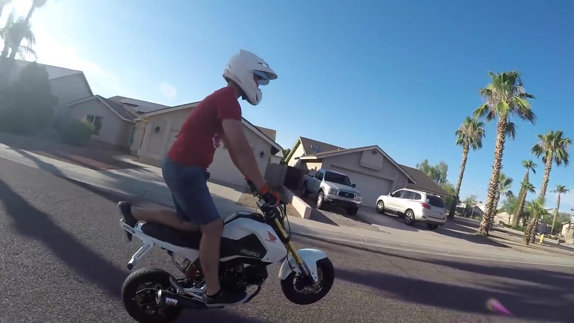 Attempting to get phone numbers from strangers while riding motorcycle