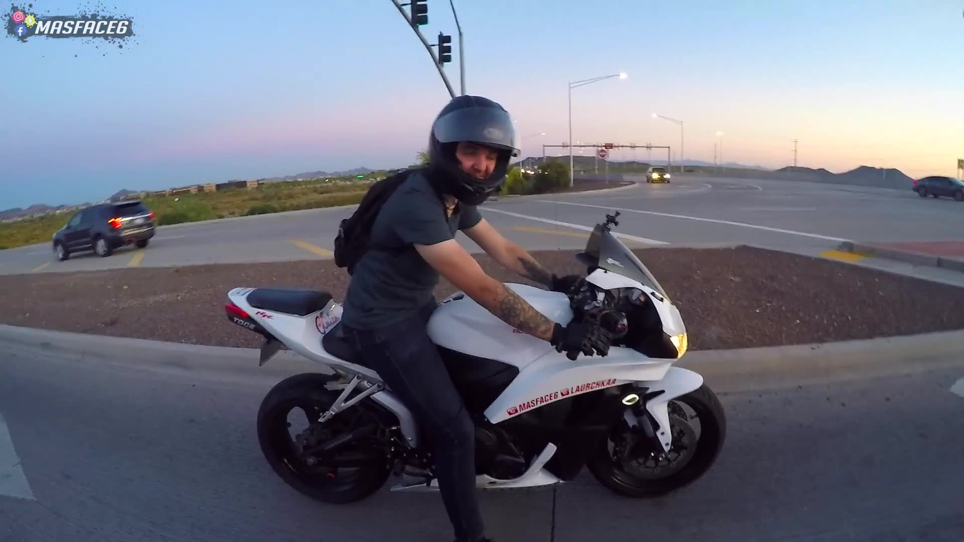 Taking motorcycles through coffee shop drive-through for employee reactions