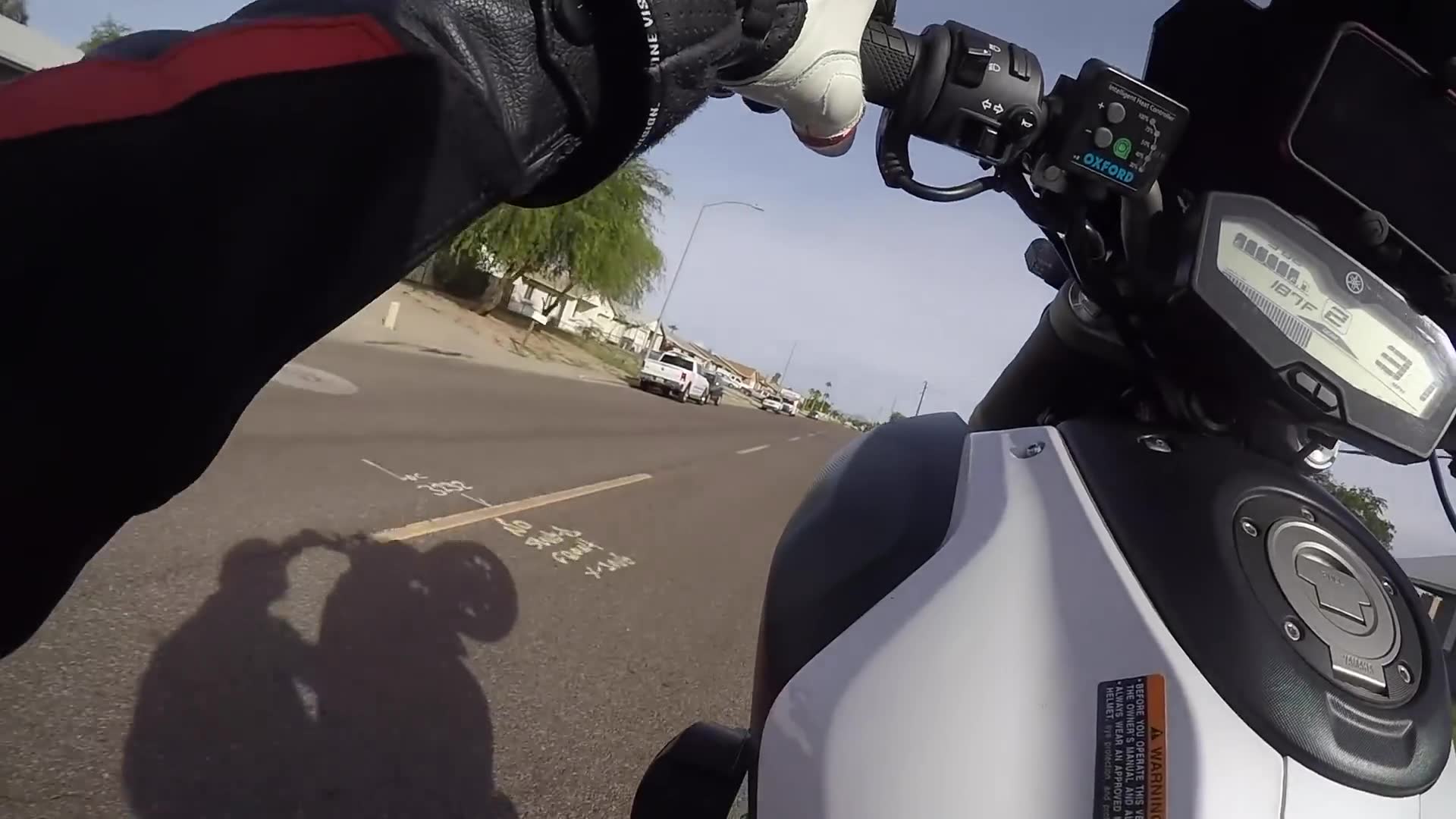 Skilled riding demonstration showing advanced motorcycle techniques