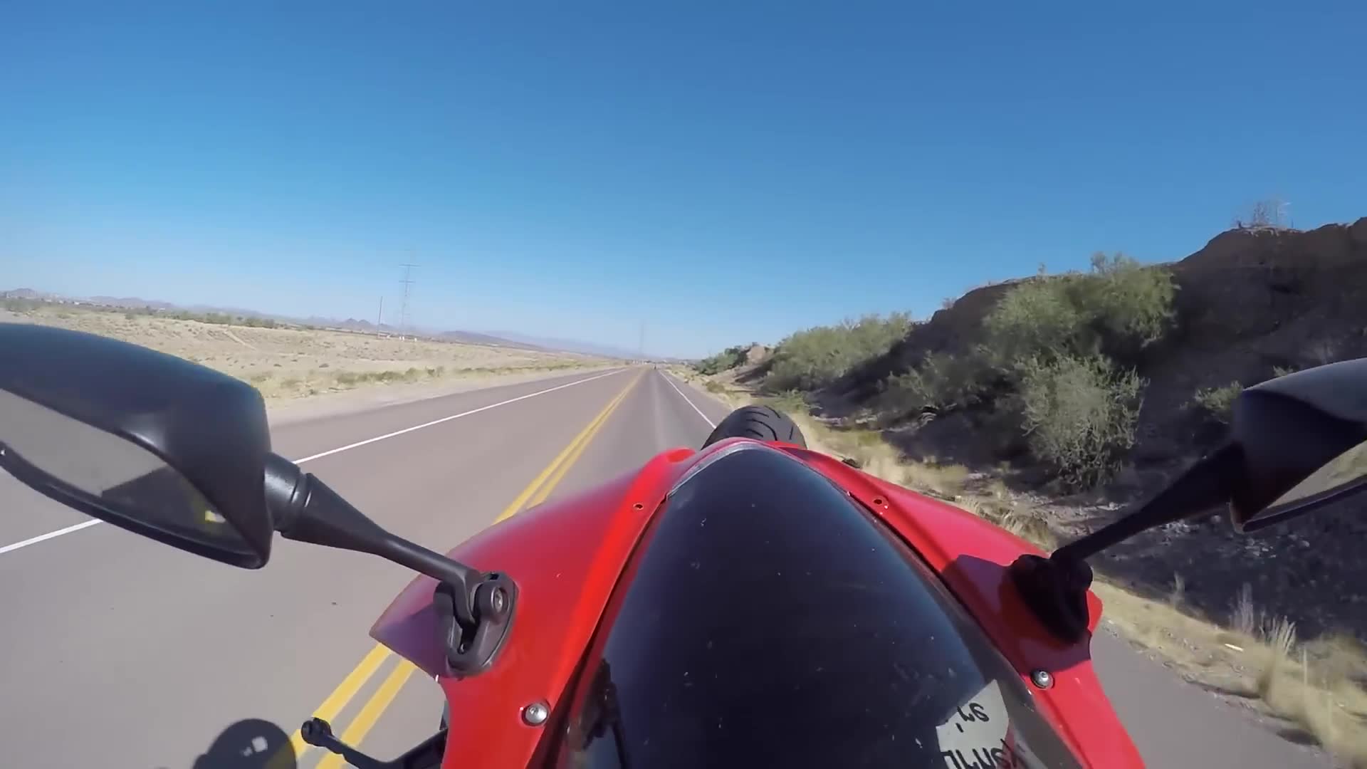 Detailed tutorial explaining proper wheelie technique on sport motorcycles