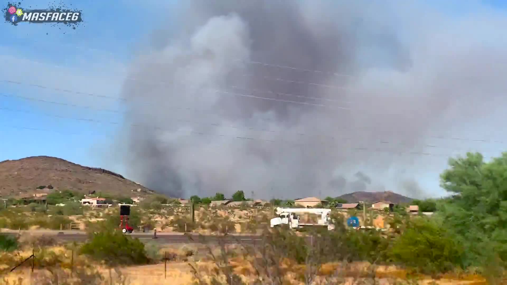 Documenting dangerous wildfire situation threatening local area