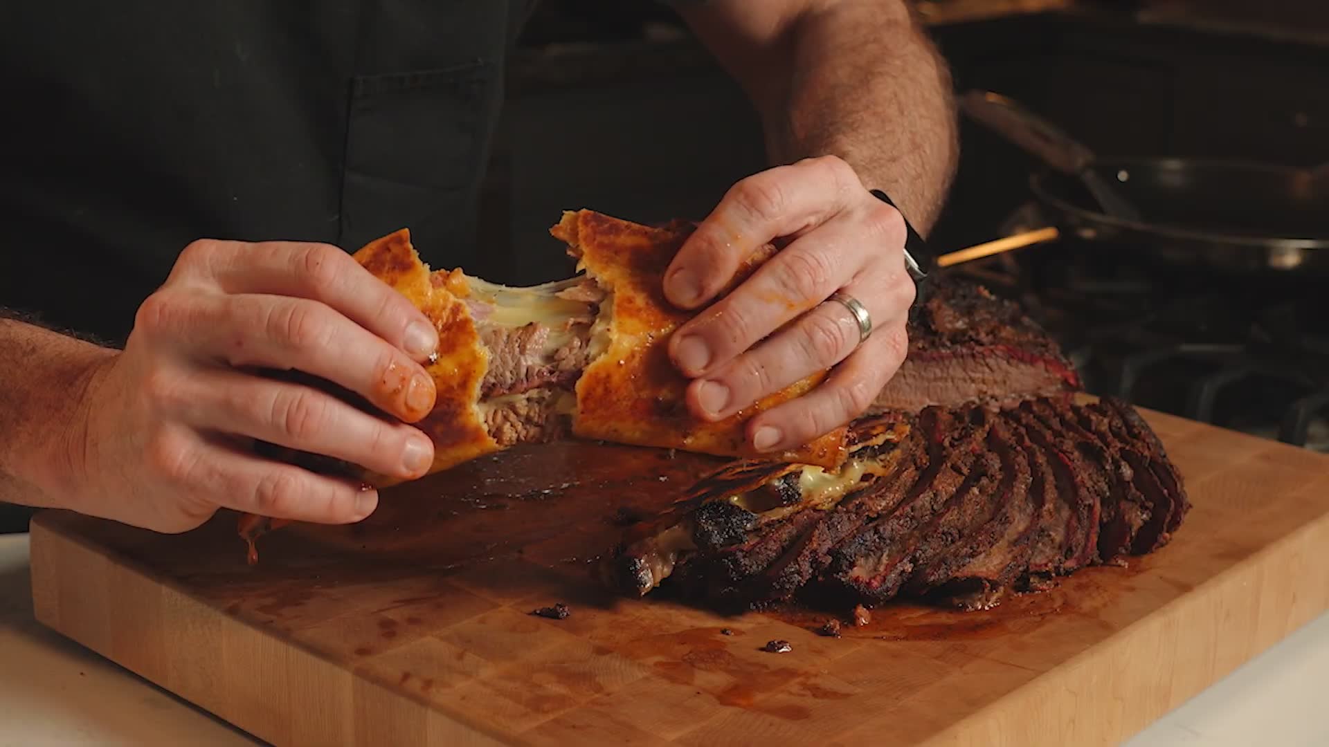Smoked brisket birria tacos with melted cheese
