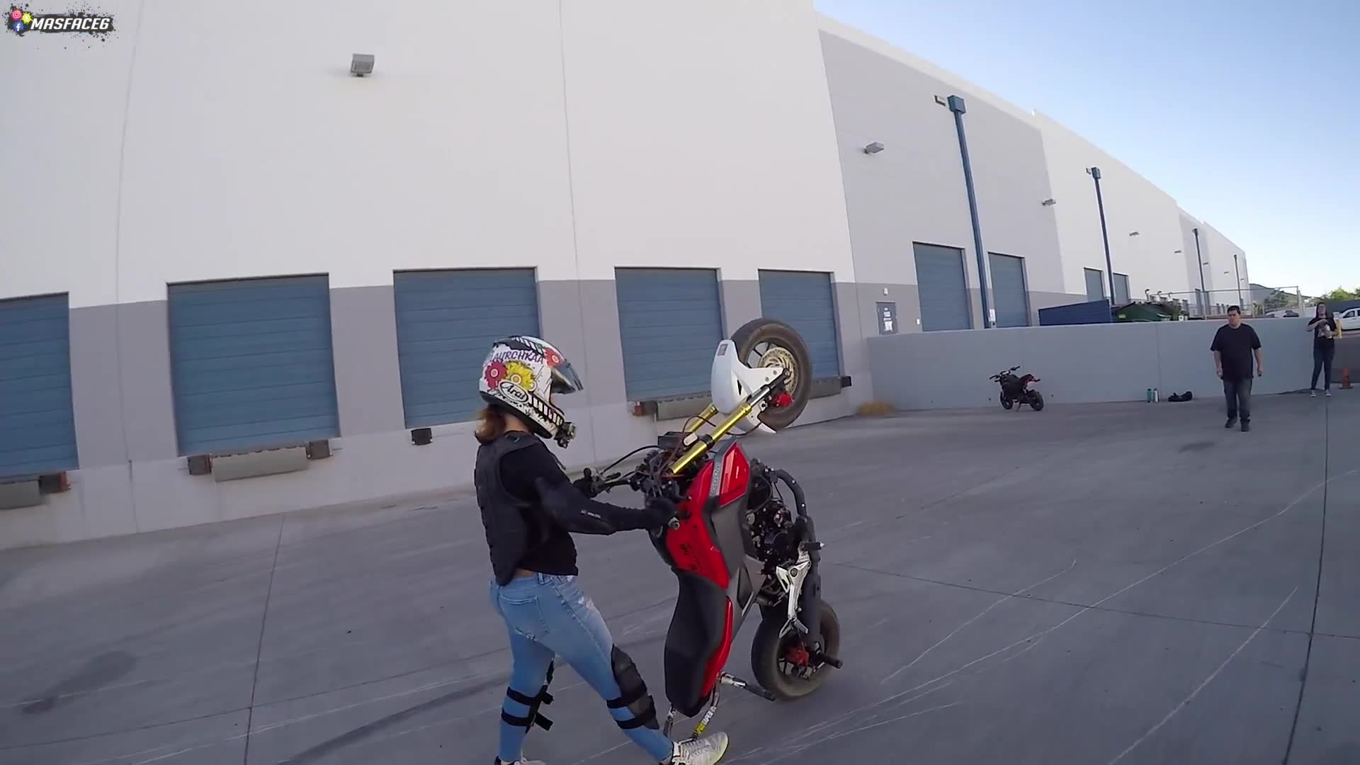 Another wheelie training session as she works on getting the front wheel higher each try