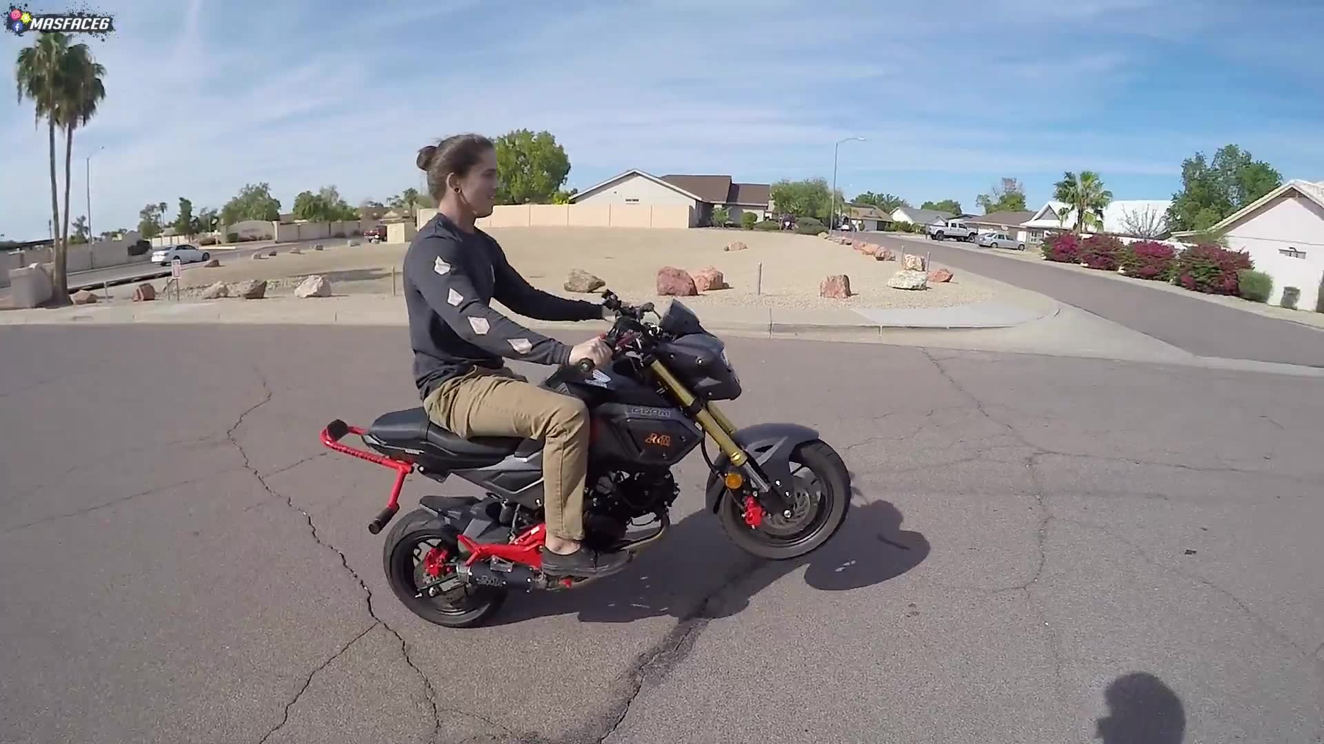 Teaching a new rider the basics of wheelies and watching his confidence build each try