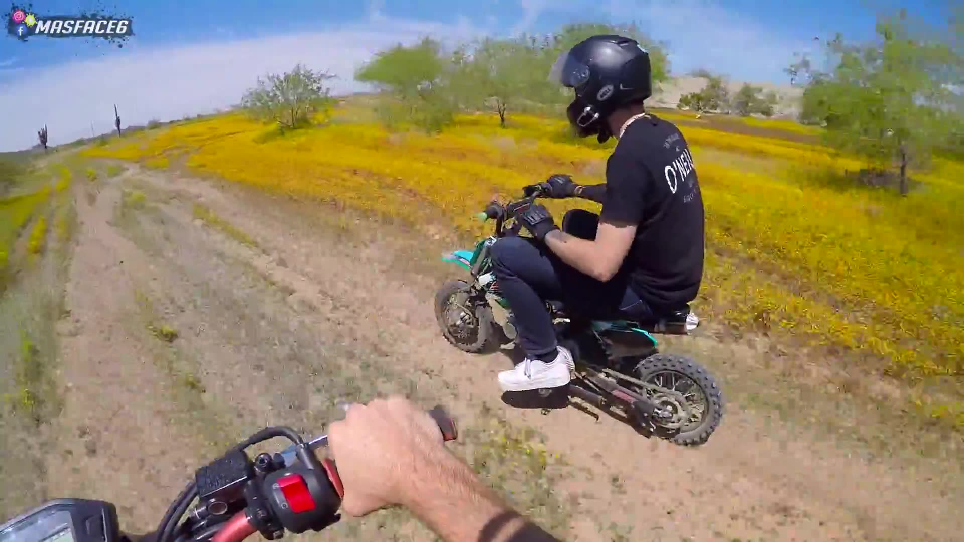Tiny pit bike tackles the highway overpass and the ride is as sketchy as it sounds