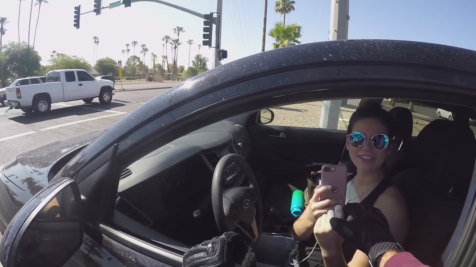 Buying extra food and handing it out to people along the ride from the motorcycle
