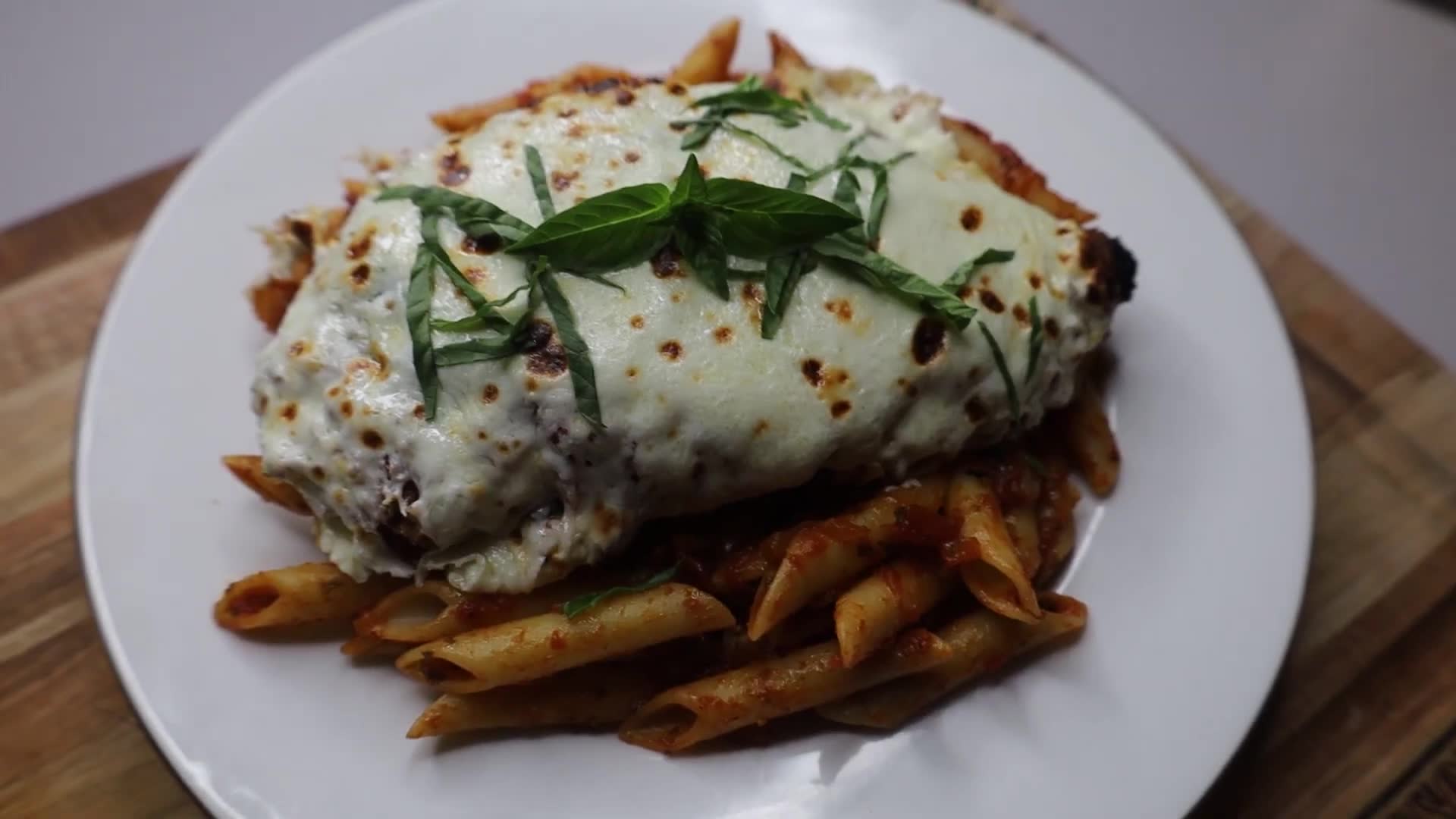 Incredibly delicious chicken parmesan recipe with crispy breading throughout