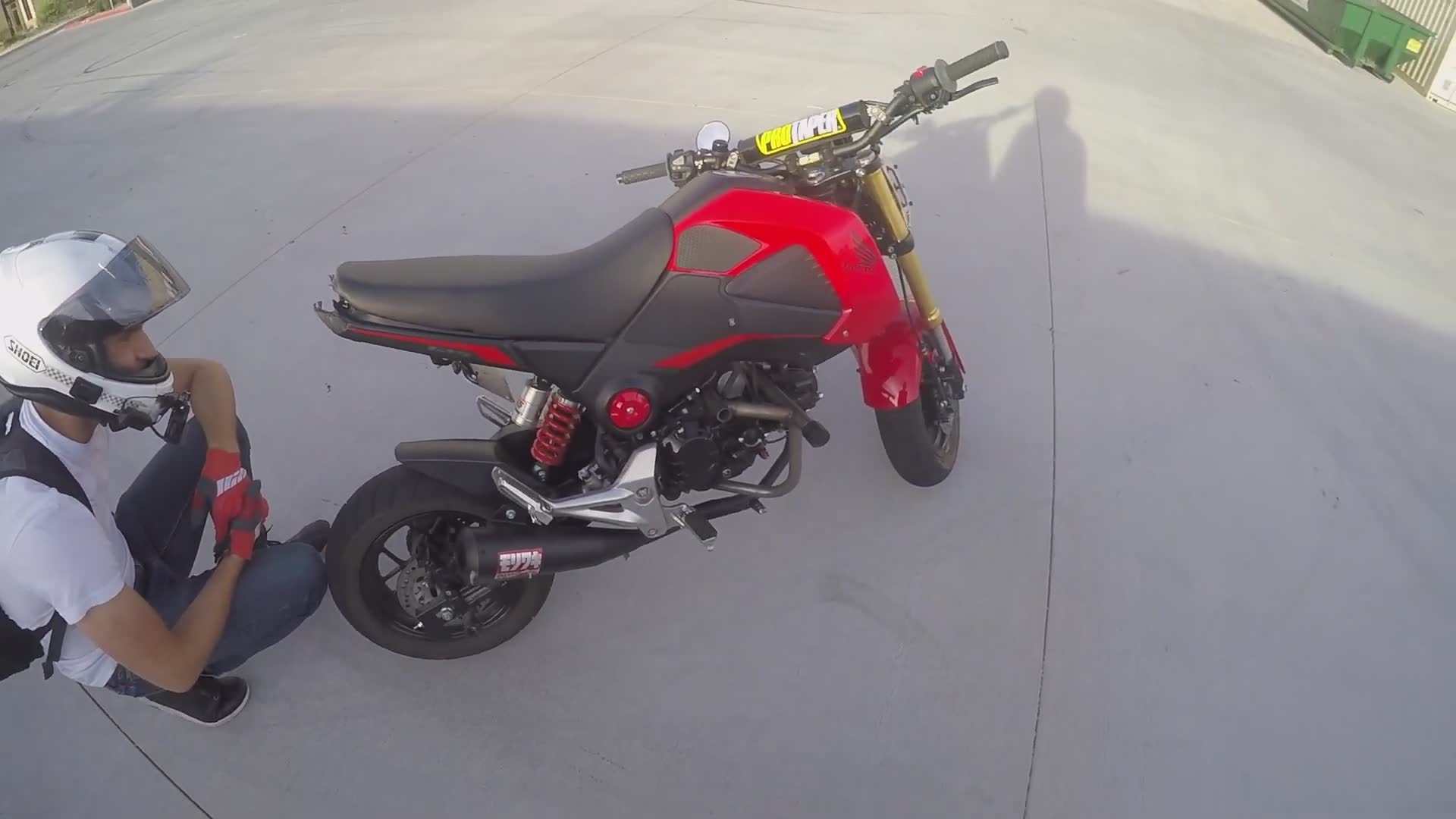 Looking at the current state of the beat-up mini bikes after extensive stunt practice