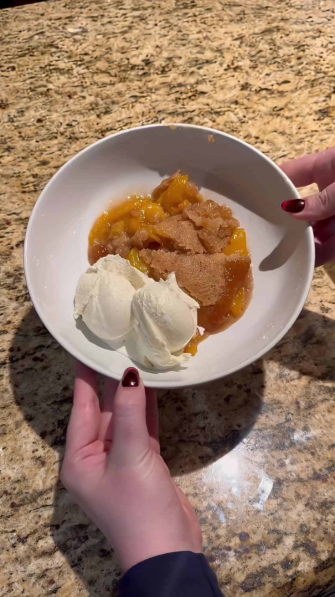 Creating special peach dessert with homemade ice cream for dad