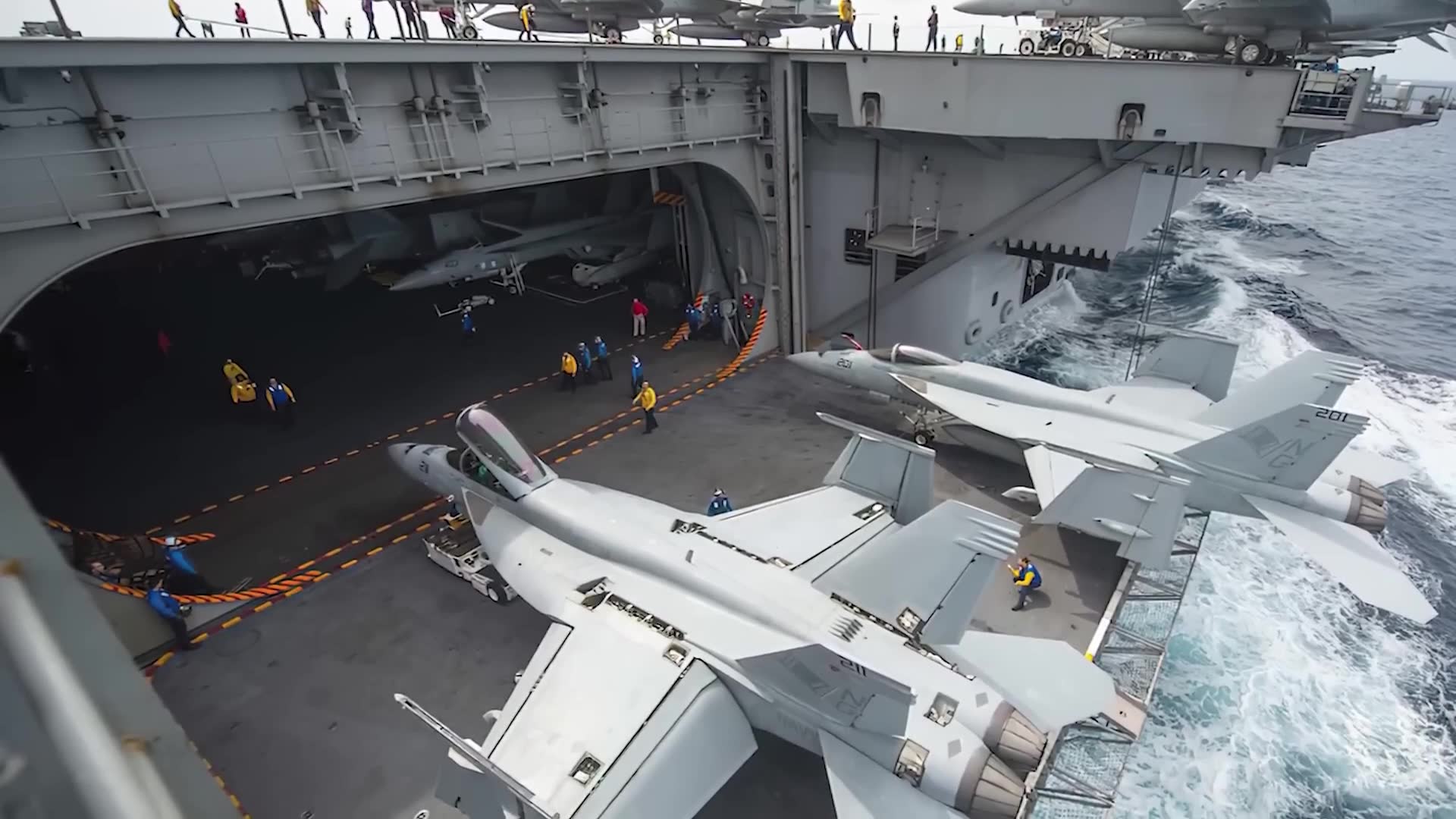 Deck elevator operations on supercarrier flight deck enable aircraft movement