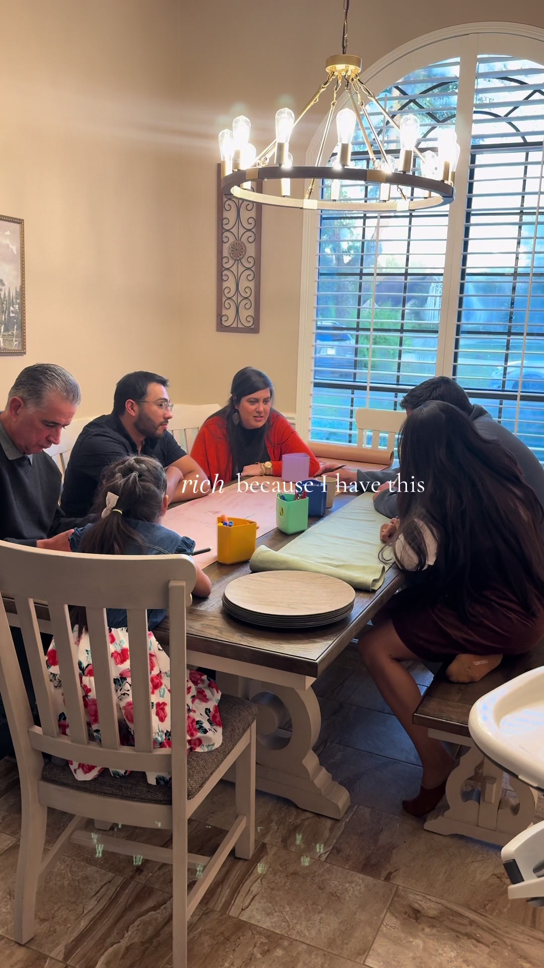 Feeling rich because of family gathering for crafting around the table at home