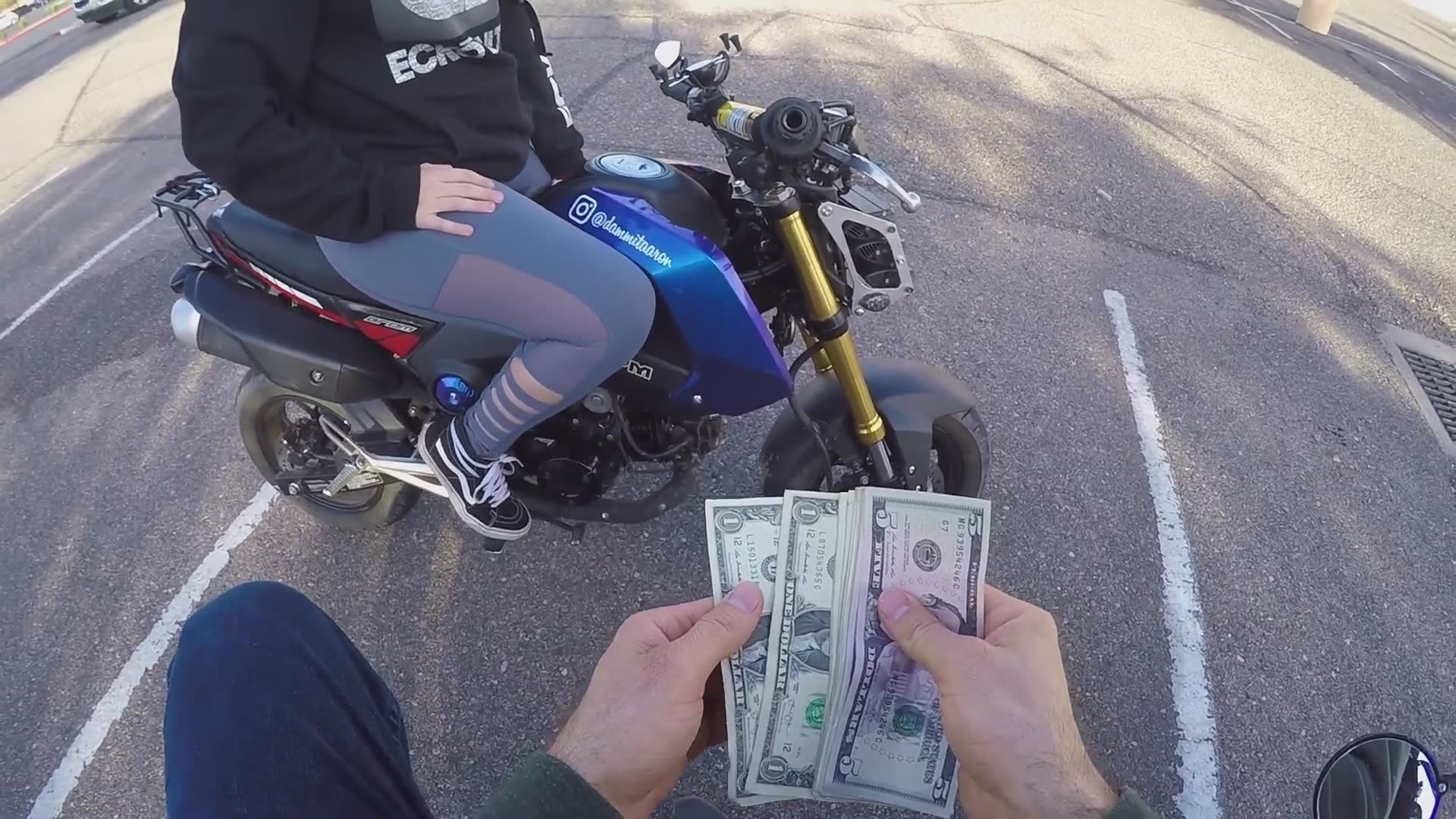 What will you give me for a dollar caught on camera during motorcycle adventure