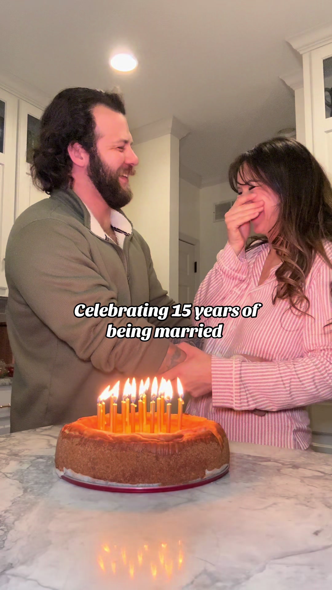 Anniversary celebration featuring special cake and candle ceremony
