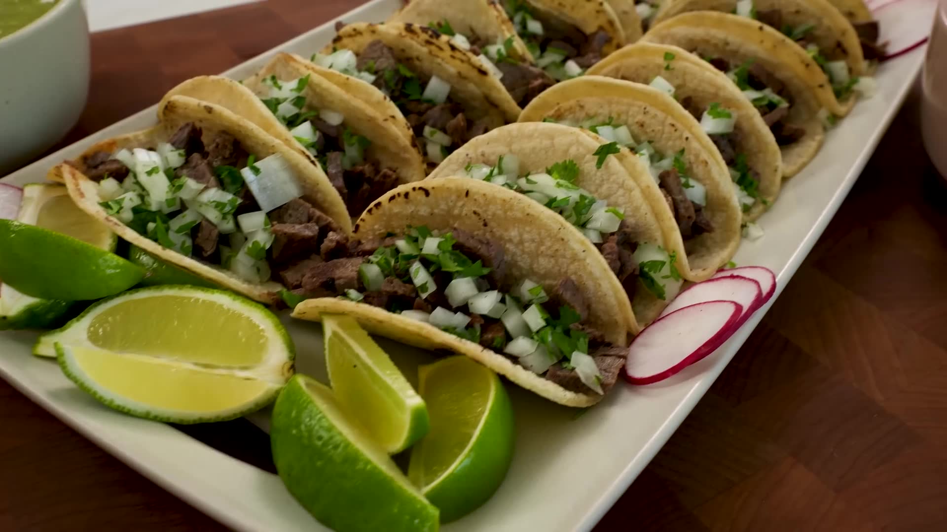 Traditional Mexican carne asada taco preparation