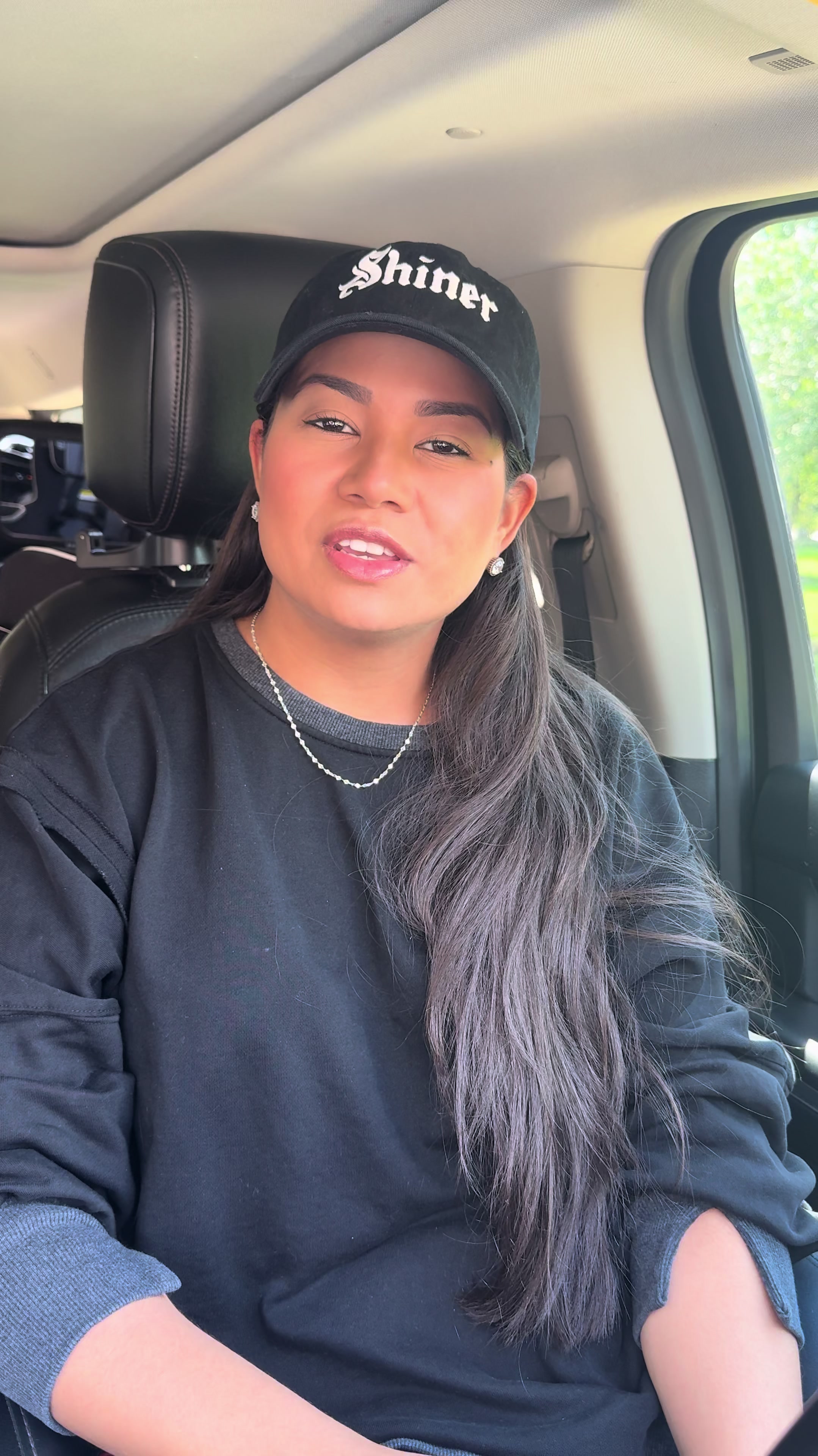 Woman in shiner hat car vlog getting day started late improving bad mood with coffee