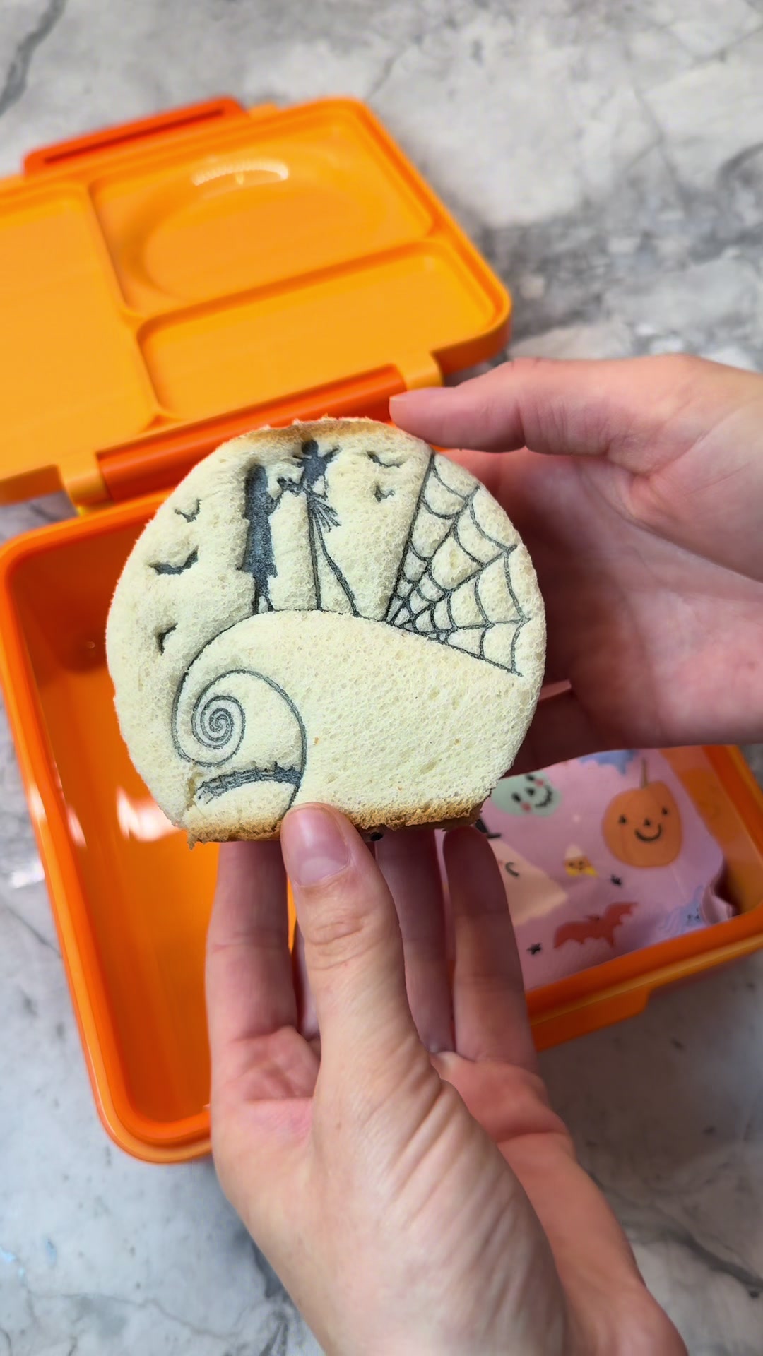 Sandwich artistry tuna lunch decorated with precision food pens