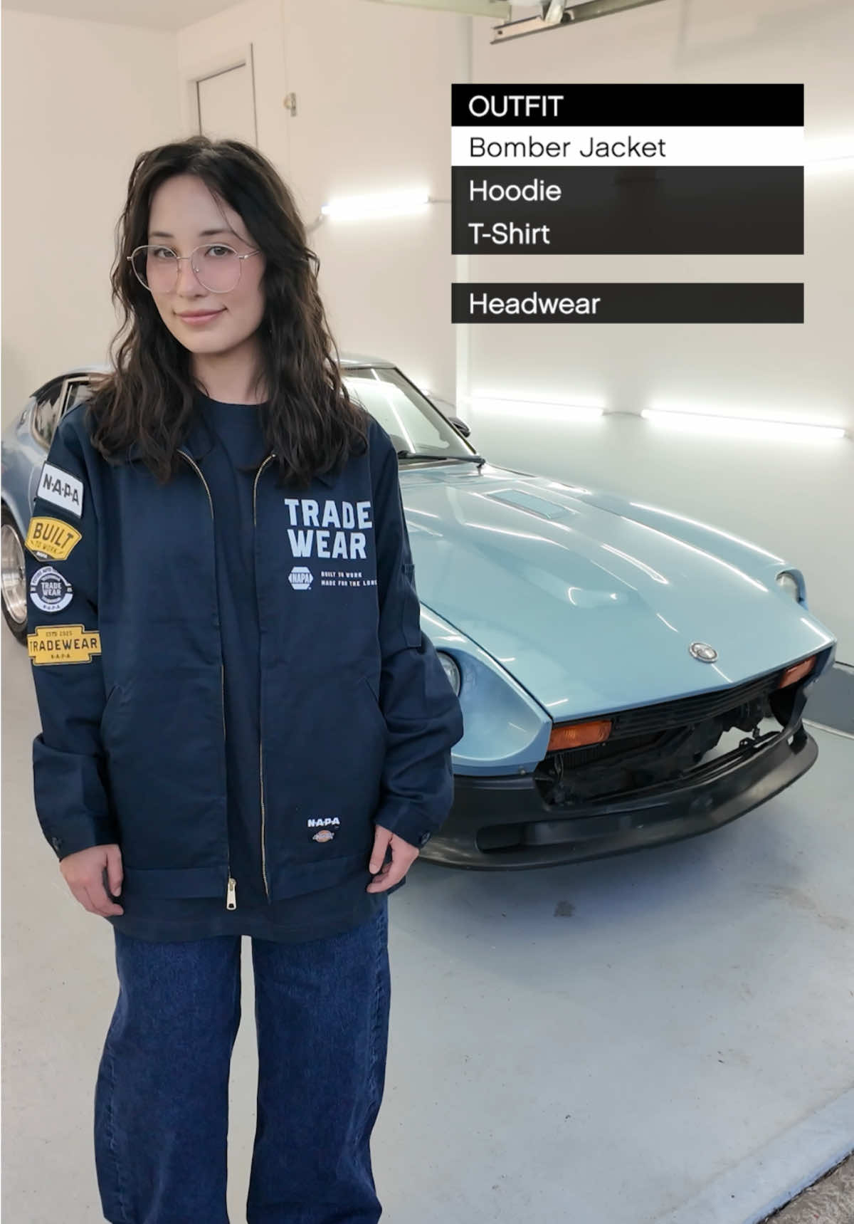 Styling automotive workwear with jeans for a casual car enthusiast look