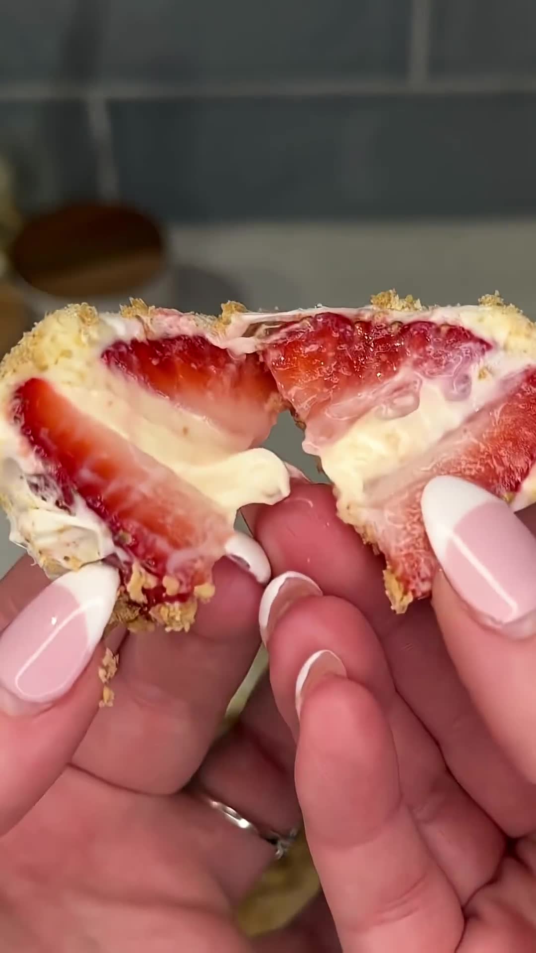 Individual strawberry desserts feature smooth cheesecake center