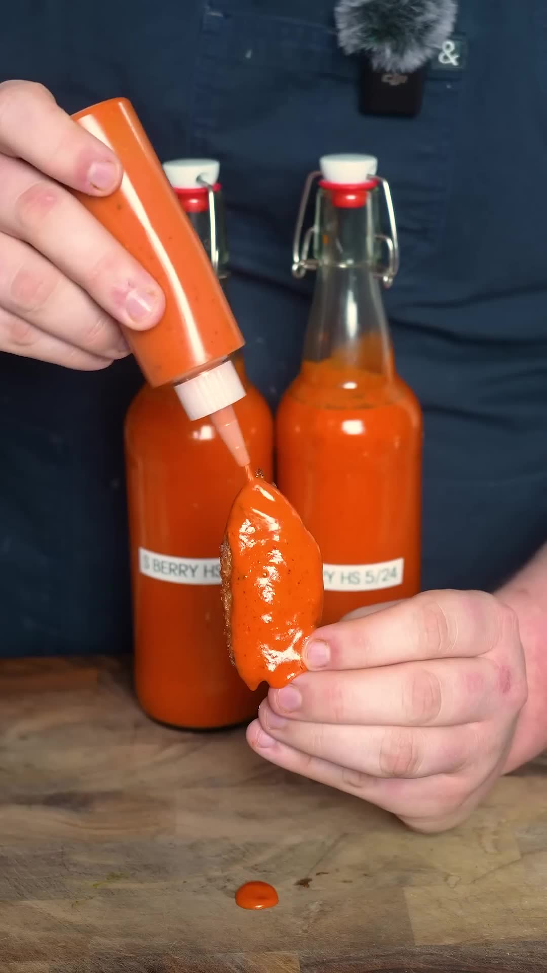 Spicy fermented strawberry and pepper hot sauce that requires caution