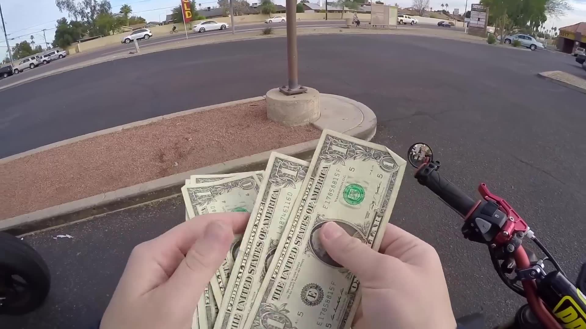 What will you give me for a dollar caught on camera during motorcycle adventure