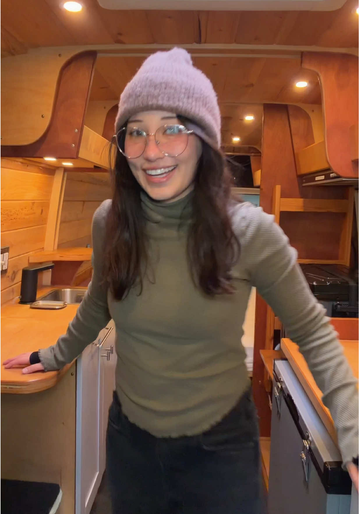 Inside the camper van conversion from front to back