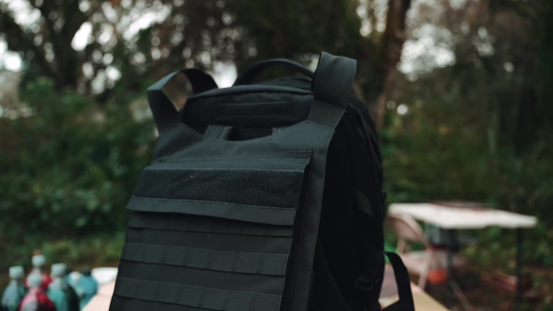 Bulletproof backpack tested against pistol rounds to verify the safety claims
