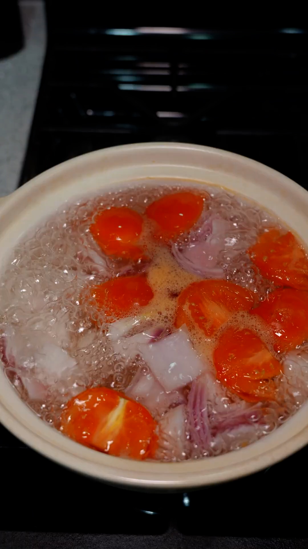 Traditional Filipino sinigang with the perfect balance of sour and savory