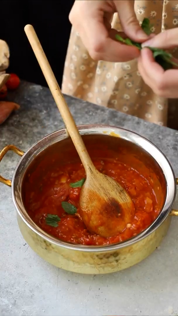 Pillowy potato gnocchi in spicy tomato sauce