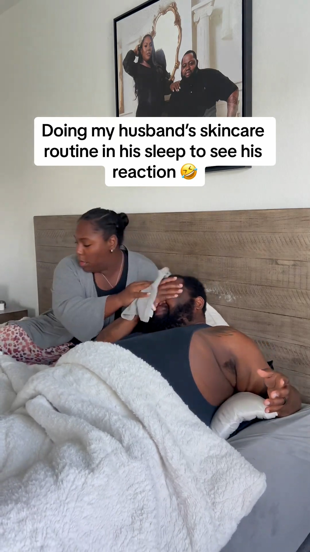 Putting skincare products on sleeping husband's face