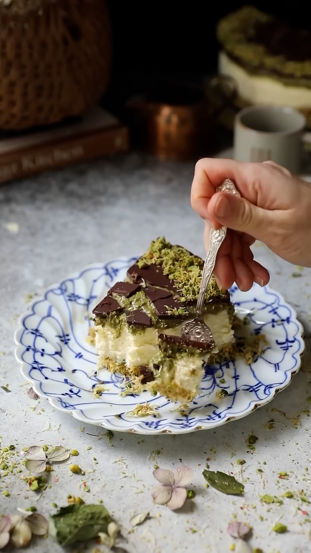 Cheesecake topped with pistachio chocolate crumbles