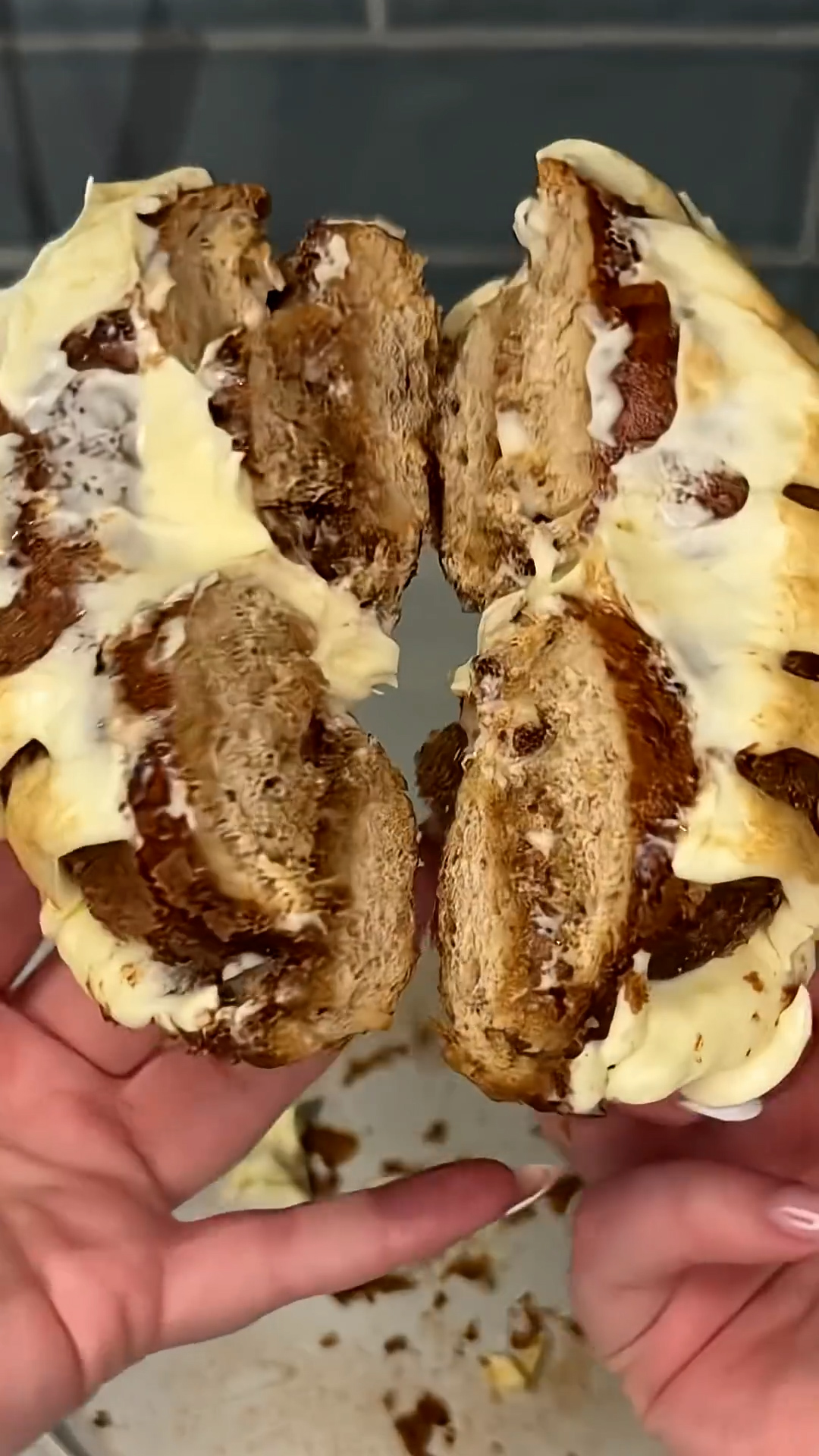 Plain bagel topped with sweetened cream cheese and cinnamon dust