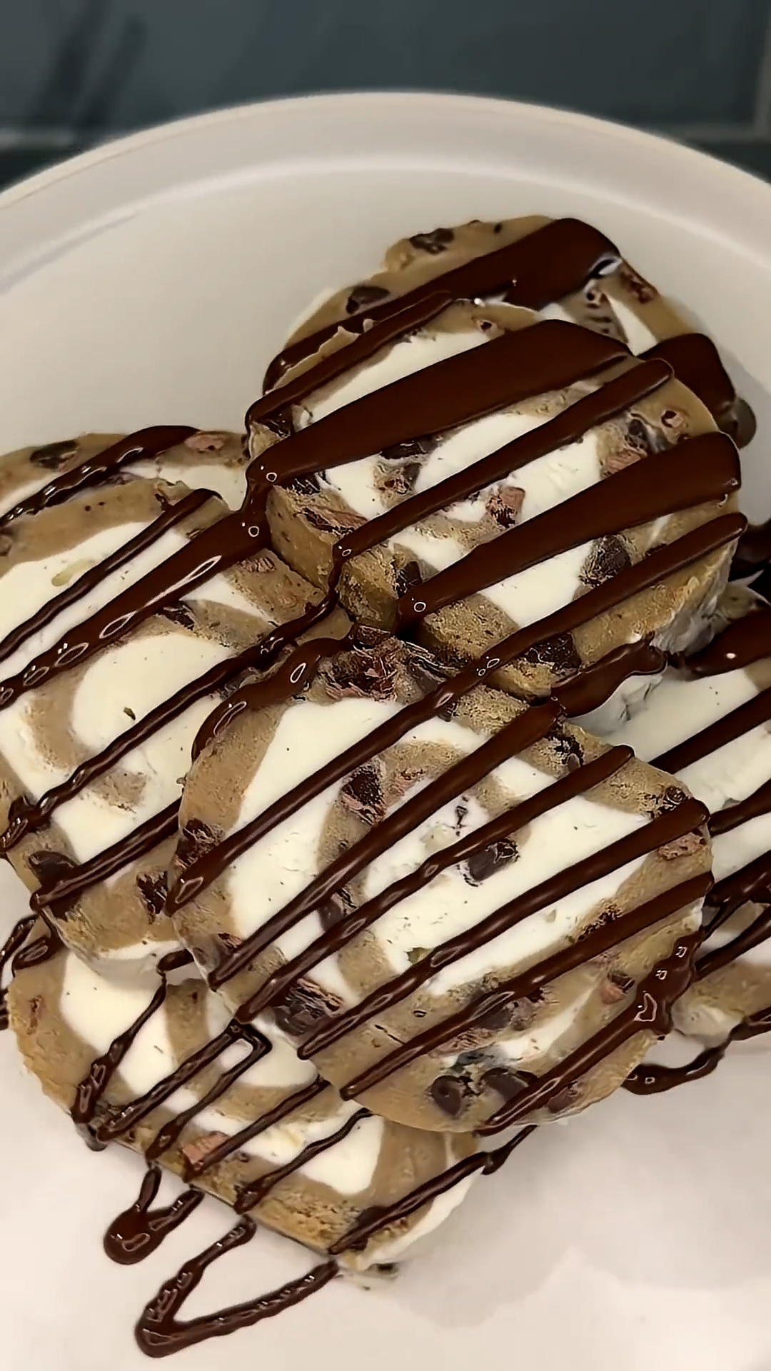 Safe dough mixed with ice cream and scraped into cylindrical shapes