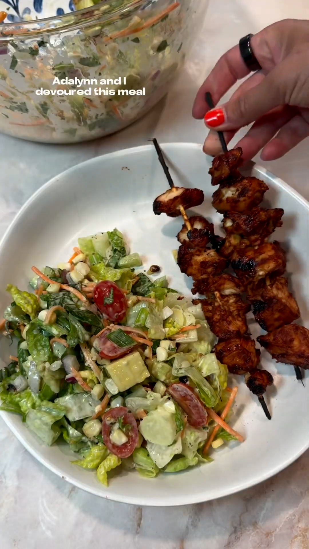 Smoky chicken kabobs on bed of crisp greens everyone will enjoy