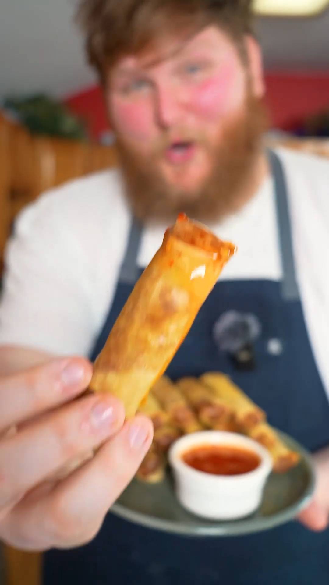 Crispy Filipino pork lumpia spring rolls with sweet chili sauce