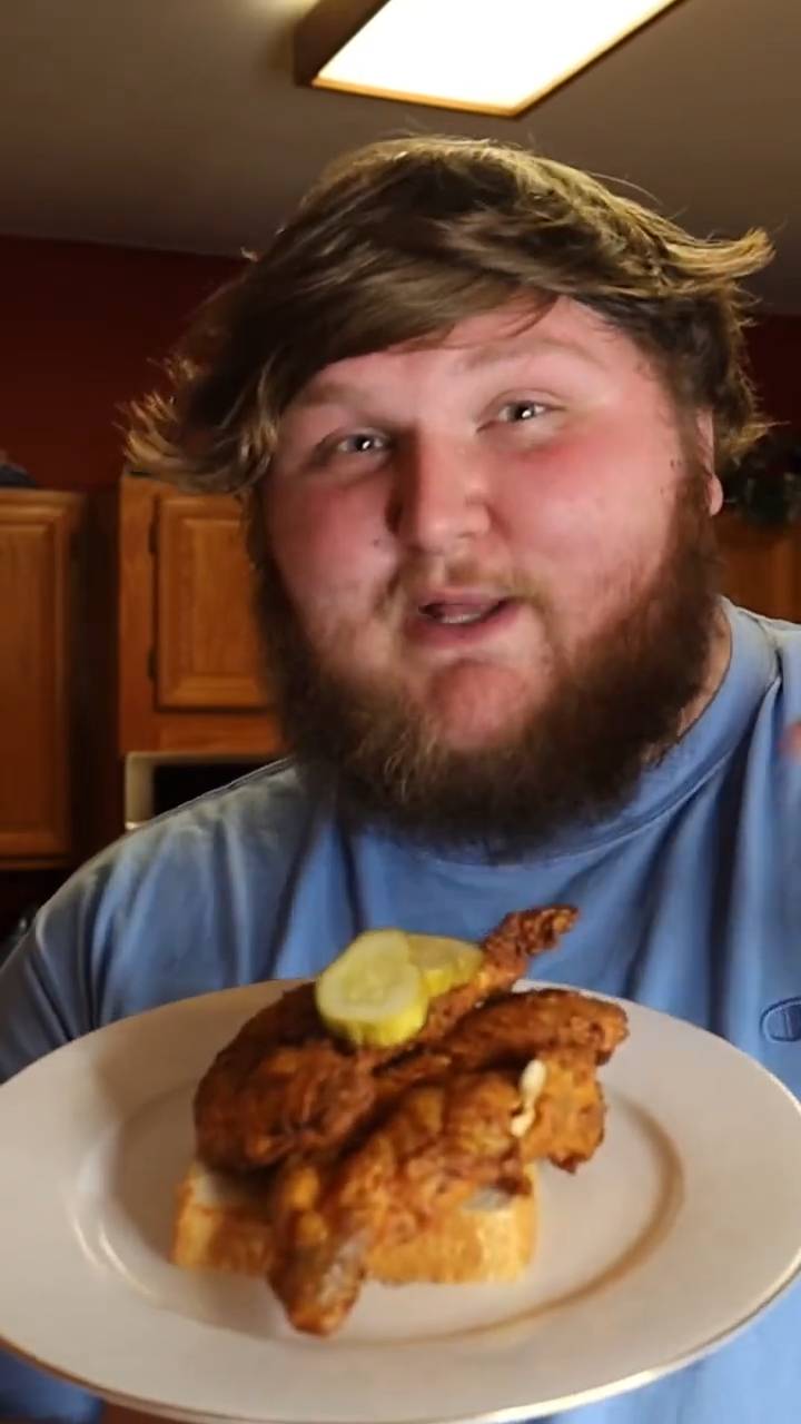 Nashville hot chicken tenders with cayenne oil and dill pickles