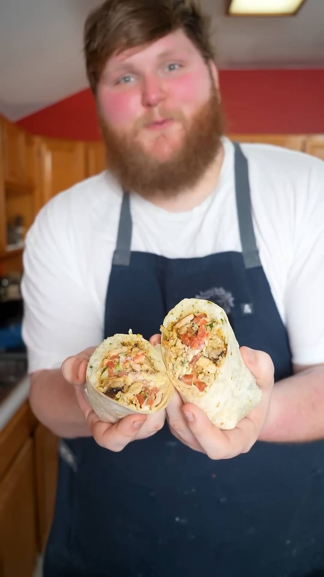 Loaded chicken burrito with lime-cilantro rice and fresh guacamole