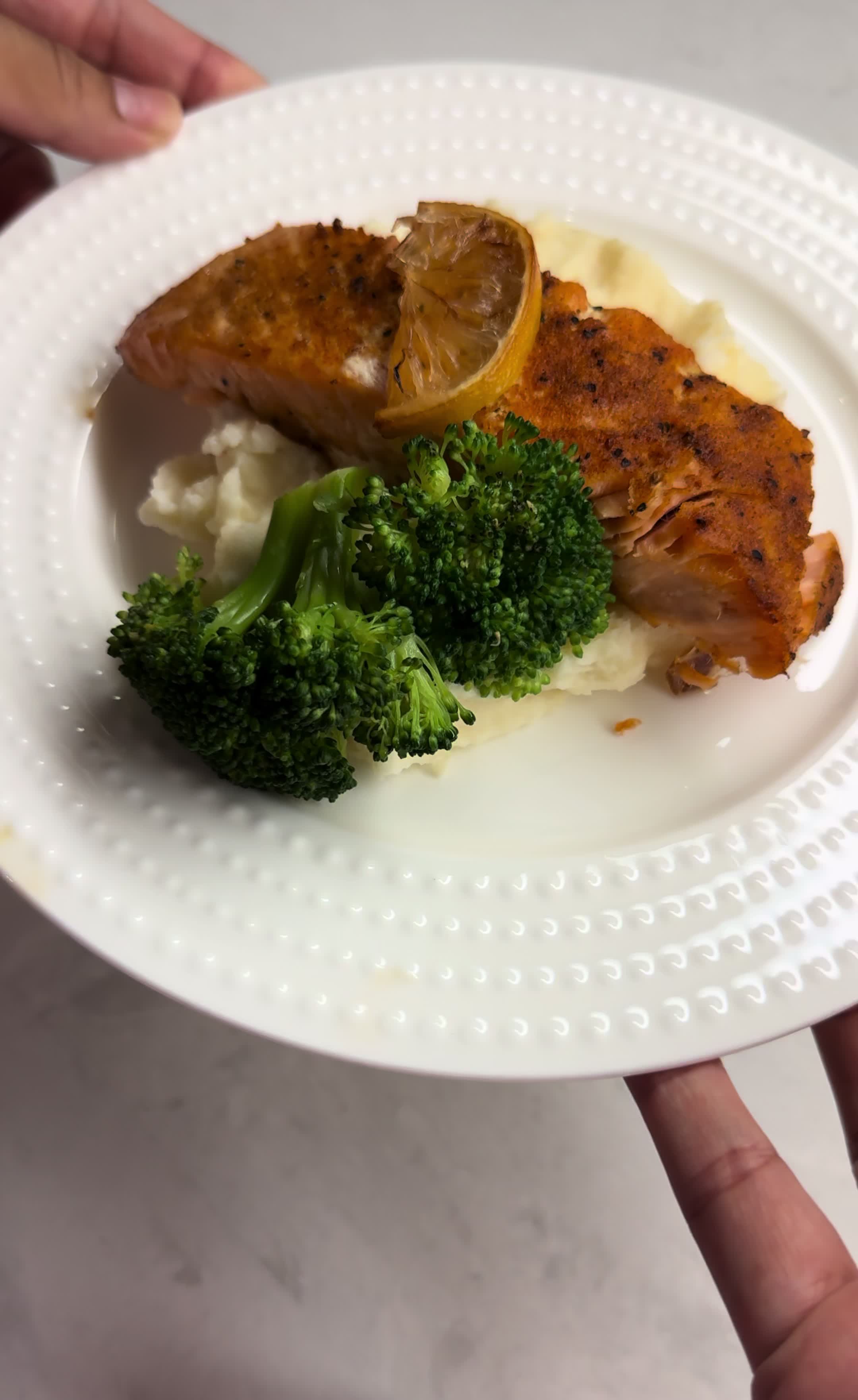 Making perfectly flaky baked salmon with bright citrus seasoning and a side of broccoli