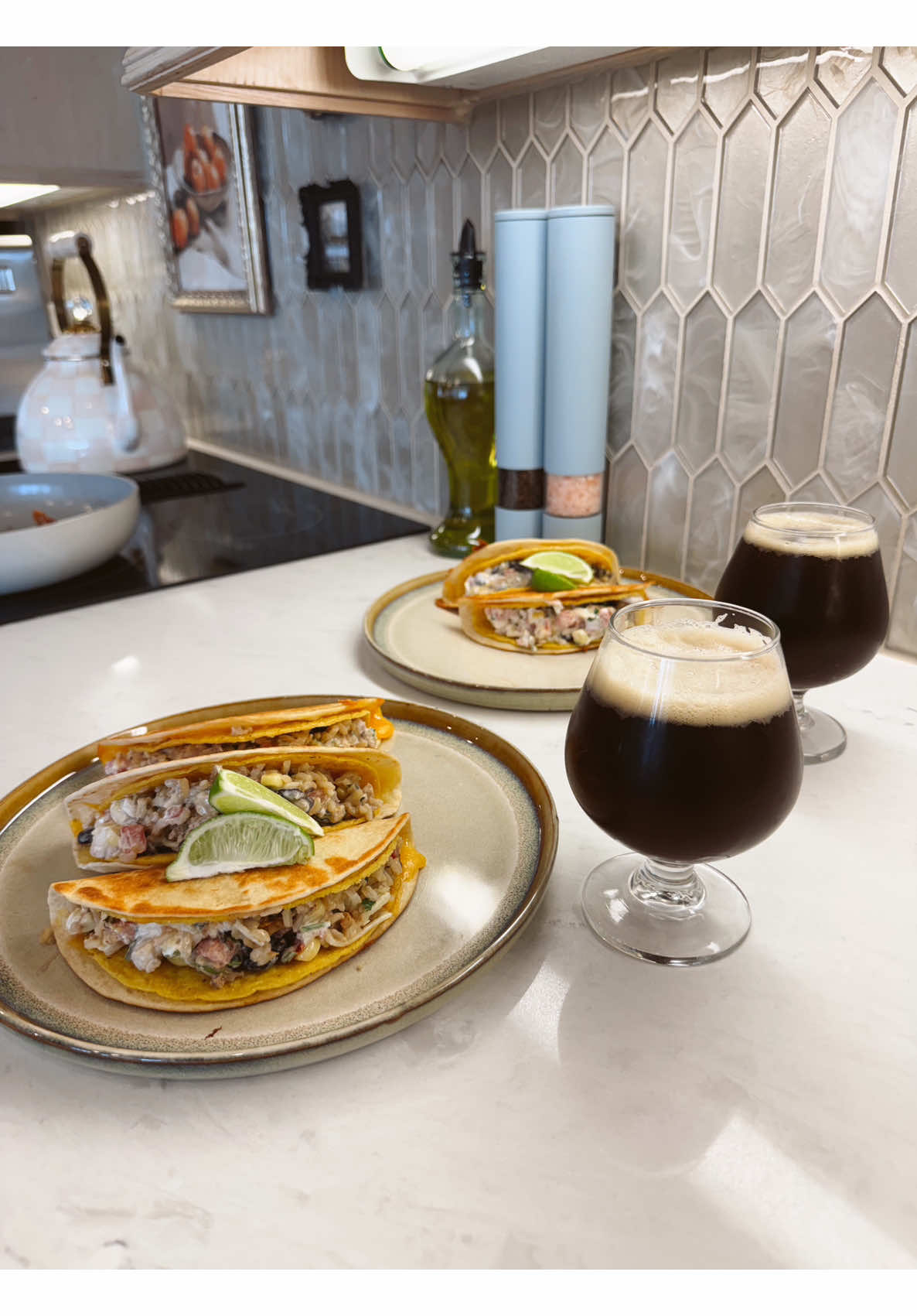 Cooking cheesy rice and black bean quesadillas paired with a rich dark stout tonight
